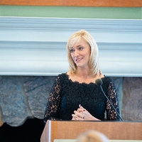 Distinguished Alumni giving speech